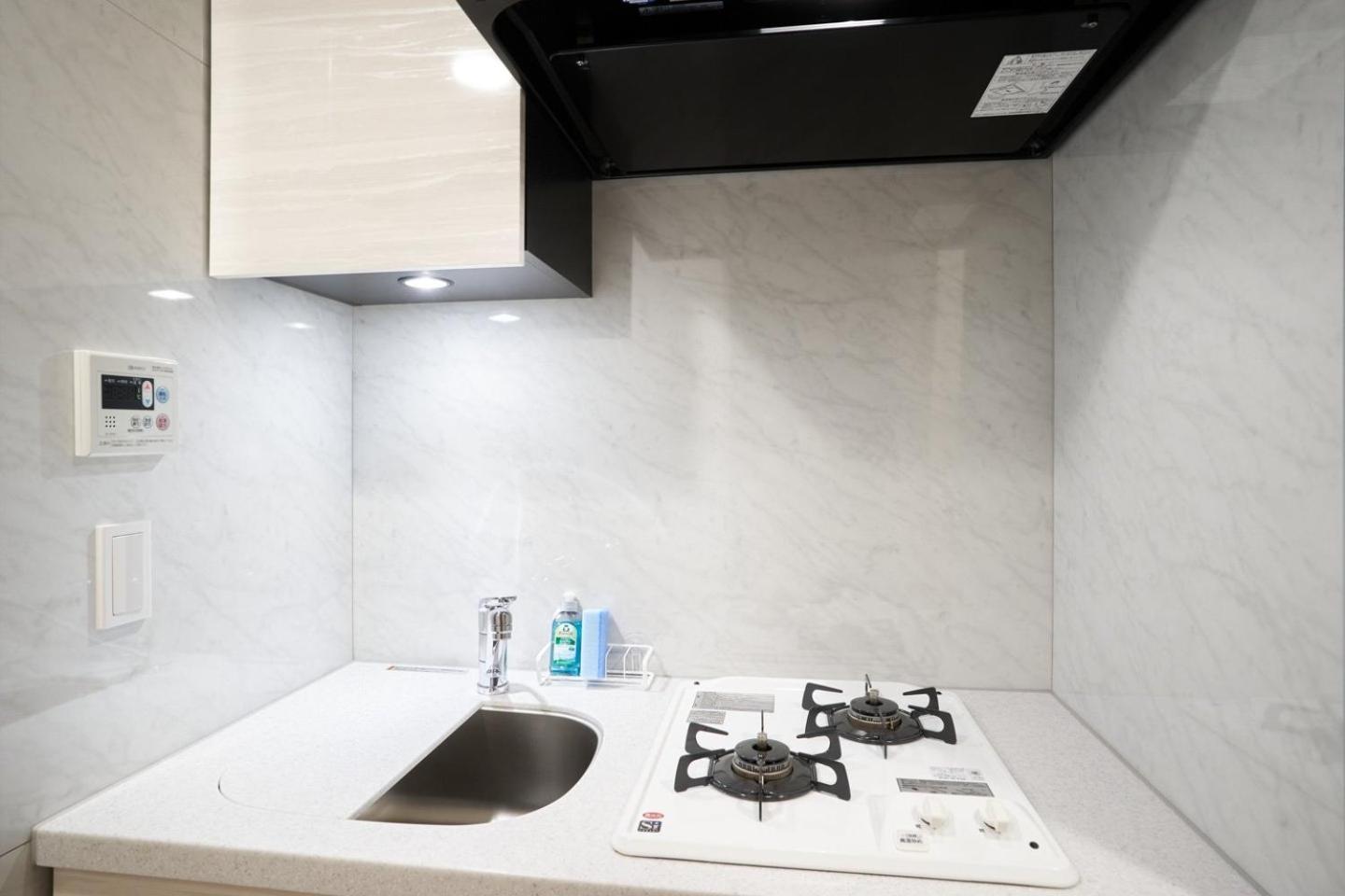 Mat Shinjuku West Apartemen *